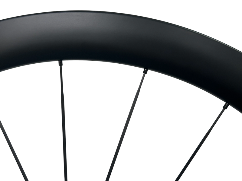 Carbon fiber spokes on a carbon fiber road wheel